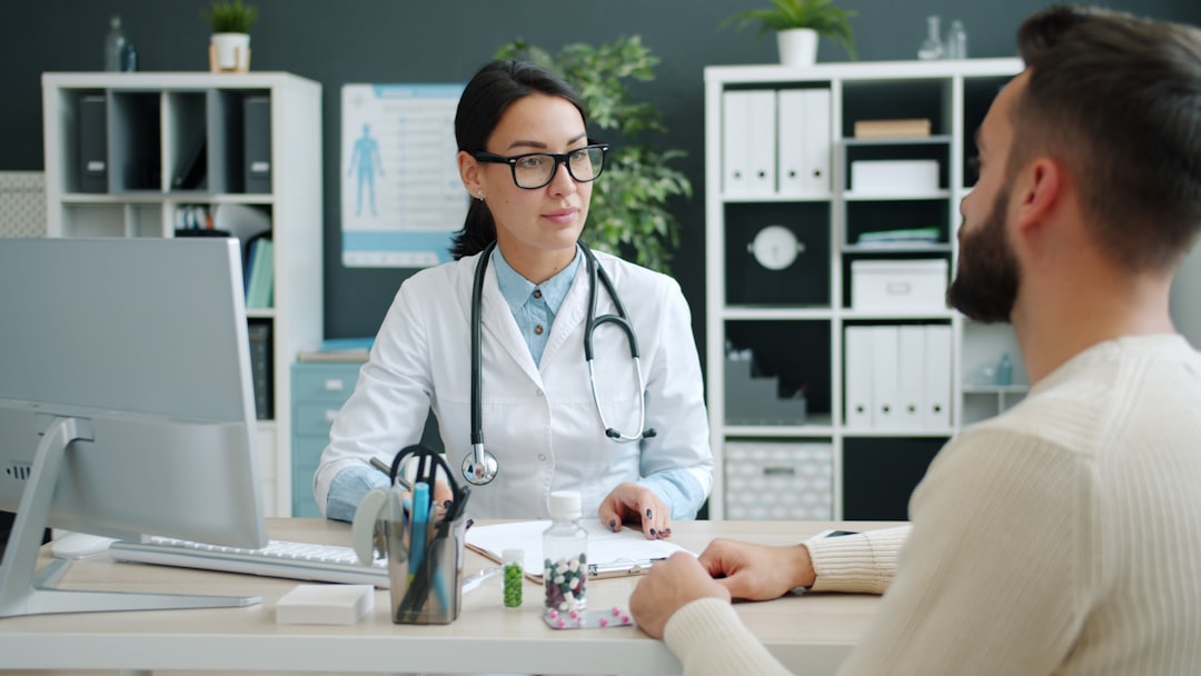 man consulting with a doctor about hormone health and testosterone decline